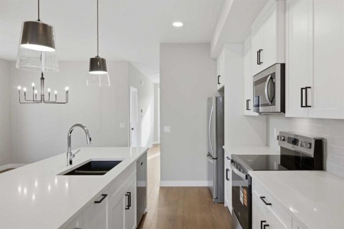 51 Belvedere Crescent Se, Calgary, AB - Indoor Photo Showing Kitchen With Double Sink With Upgraded Kitchen