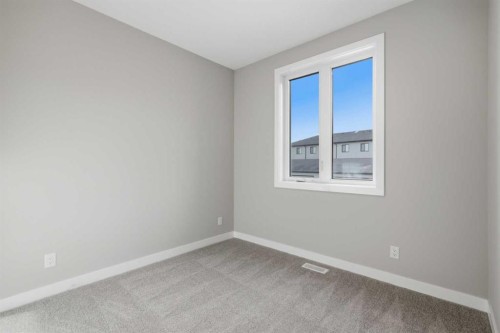 51 Belvedere Crescent Se, Calgary, AB - Indoor Photo Showing Other Room