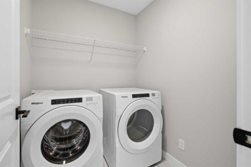 51 Belvedere Crescent Se, Calgary, AB - Indoor Photo Showing Laundry Room