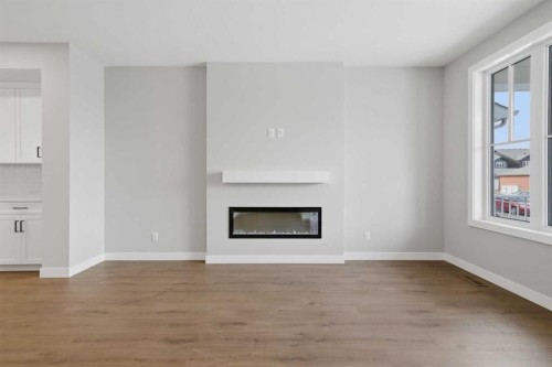 51 Belvedere Crescent Se, Calgary, AB - Indoor Photo Showing Living Room With Fireplace