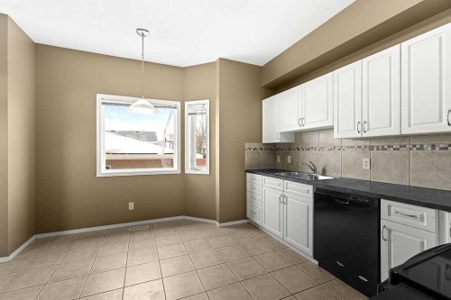 215 Strathcona Circle, Strathmore, AB - Indoor Photo Showing Kitchen With Double Sink