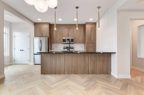 466 River Avenue, Cochrane, AB - Indoor Photo Showing Kitchen With Upgraded Kitchen