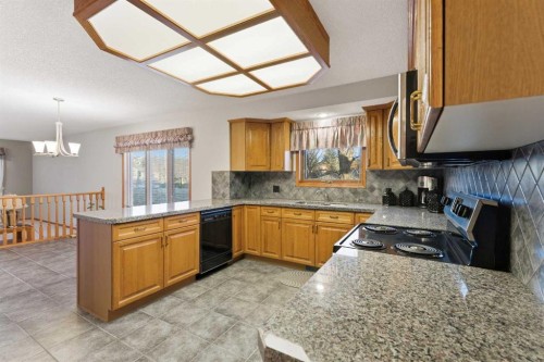 531 Sierra Morena Court Sw, Calgary, AB - Indoor Photo Showing Kitchen With Double Sink