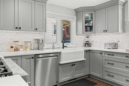 51 Hunters Crescent, Okotoks, AB - Indoor Photo Showing Kitchen With Upgraded Kitchen