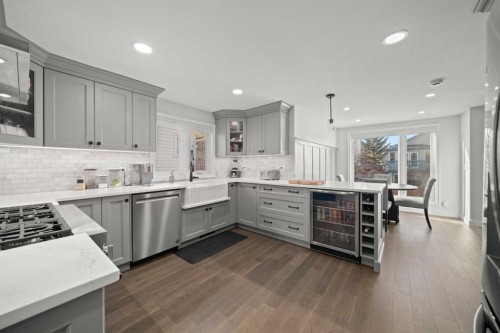 51 Hunters Crescent, Okotoks, AB - Indoor Photo Showing Kitchen With Upgraded Kitchen