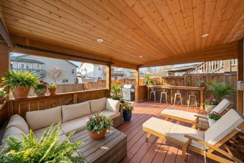 51 Hunters Crescent, Okotoks, AB - Outdoor With Deck Patio Veranda With Exterior