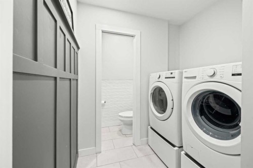 51 Hunters Crescent, Okotoks, AB - Indoor Photo Showing Laundry Room