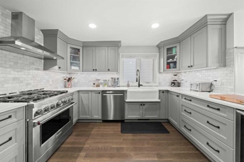 51 Hunters Crescent, Okotoks, AB - Indoor Photo Showing Kitchen With Upgraded Kitchen