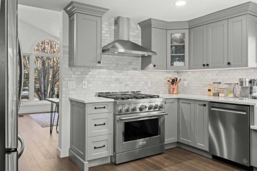 51 Hunters Crescent, Okotoks, AB - Indoor Photo Showing Kitchen With Upgraded Kitchen