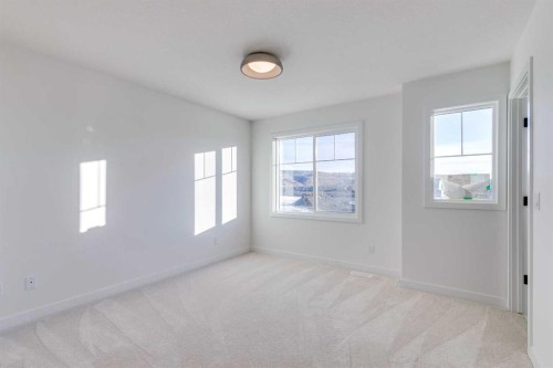 98 Agate Road, Cochrane, AB - Indoor Photo Showing Other Room