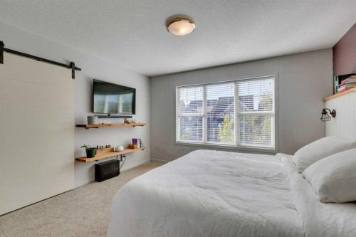 144 Masters Link Se, Calgary, AB - Indoor Photo Showing Bedroom