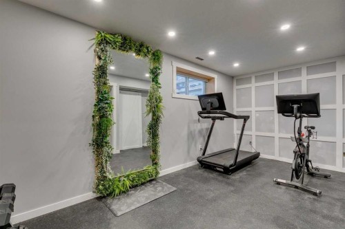 144 Masters Link Se, Calgary, AB - Indoor Photo Showing Gym Room