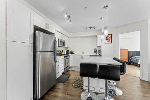 2313-99 Copperstone Park Se, Calgary, AB - Indoor Photo Showing Kitchen With Upgraded Kitchen