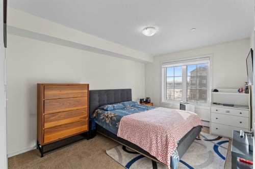 2313-99 Copperstone Park Se, Calgary, AB - Indoor Photo Showing Bedroom