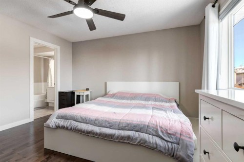 815 Tuscany Drive Nw, Calgary, AB - Indoor Photo Showing Bedroom