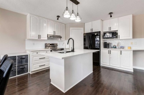 815 Tuscany Drive Nw, Calgary, AB - Indoor Photo Showing Kitchen With Upgraded Kitchen