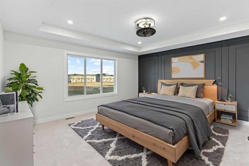14 Ranchers Meadows, Okotoks, AB - Indoor Photo Showing Bedroom