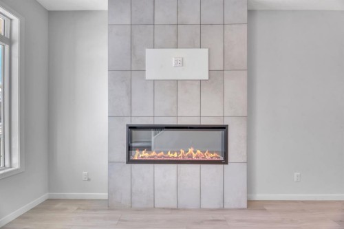 247 Annette Villas Nw, Calgary, AB - Indoor Photo Showing Other Room With Fireplace