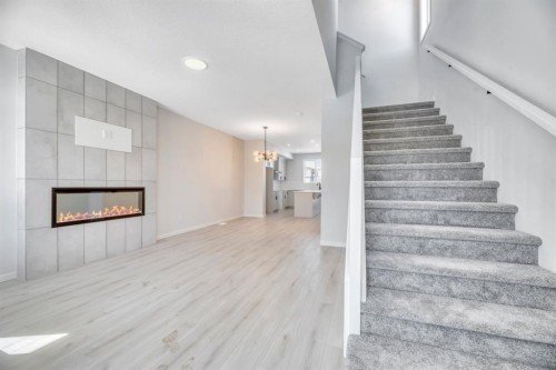 247 Annette Villas Nw, Calgary, AB - Indoor With Fireplace