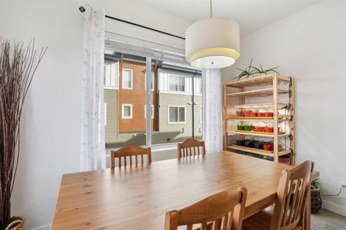 70-111 Rainbow Falls Gate, Chestermere, AB - Indoor Photo Showing Dining Room
