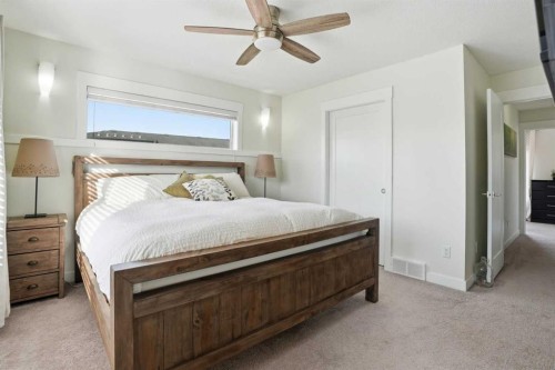 70-111 Rainbow Falls Gate, Chestermere, AB - Indoor Photo Showing Bedroom