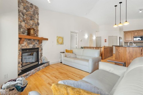 20 Ranch Road, Okotoks, AB - Indoor Photo Showing Living Room With Fireplace