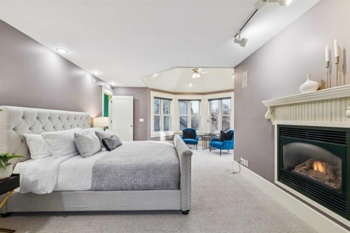 3019 6 Street Sw, Calgary, AB - Indoor Photo Showing Bedroom With Fireplace