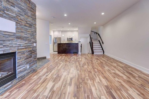 2-308 12 Avenue Ne, Calgary, AB - Indoor With Fireplace