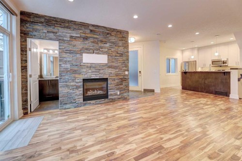 2-308 12 Avenue Ne, Calgary, AB - Indoor With Fireplace