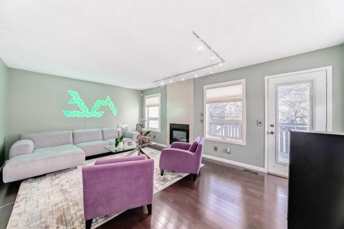 402 Citadel Heights Nw, Calgary, AB - Indoor Photo Showing Living Room With Fireplace
