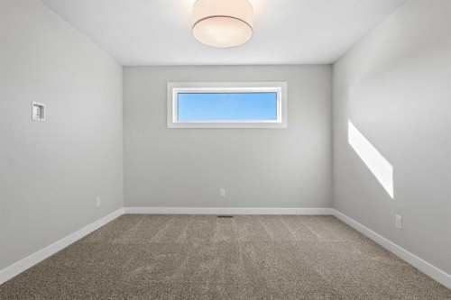 85 Quartz Crescent, Cochrane, AB - Indoor Photo Showing Other Room