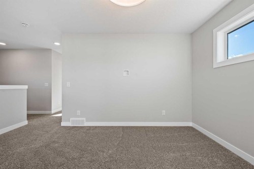85 Quartz Crescent, Cochrane, AB - Indoor Photo Showing Other Room