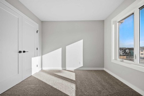 85 Quartz Crescent, Cochrane, AB - Indoor Photo Showing Other Room