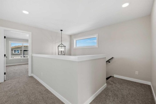 85 Quartz Crescent, Cochrane, AB - Indoor Photo Showing Other Room