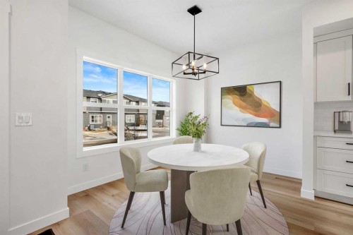 804-525 River Heights Drive, Cochrane, AB - Indoor Photo Showing Dining Room