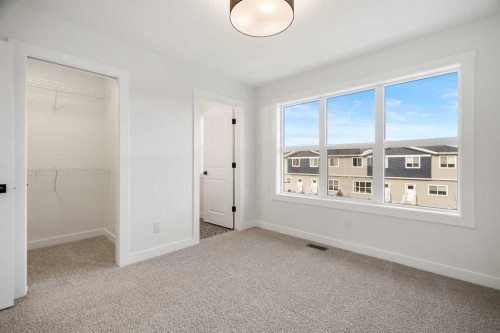 804-525 River Heights Drive, Cochrane, AB - Indoor Photo Showing Other Room