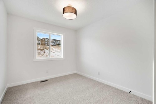 804-525 River Heights Drive, Cochrane, AB - Indoor Photo Showing Other Room
