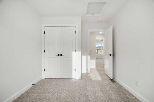 804-525 River Heights Drive, Cochrane, AB - Indoor Photo Showing Other Room