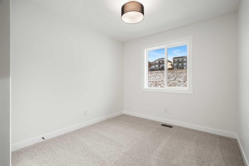 804-525 River Heights Drive, Cochrane, AB - Indoor Photo Showing Other Room