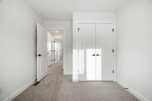 804-525 River Heights Drive, Cochrane, AB - Indoor Photo Showing Other Room