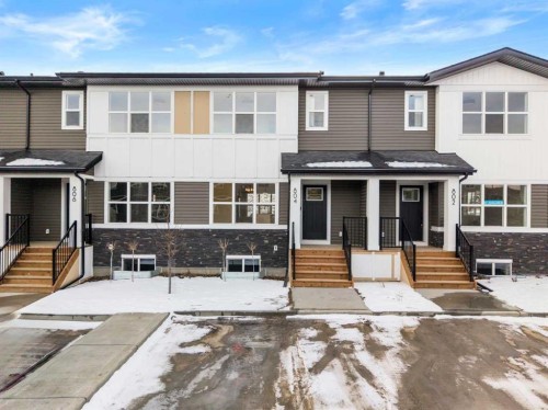 804-525 River Heights Drive, Cochrane, AB - Outdoor With Facade