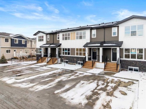 804-525 River Heights Drive, Cochrane, AB - Outdoor With Facade