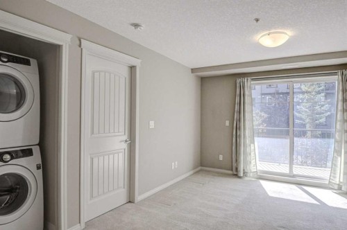 2217-130 Panatella Street Nw, Calgary, AB - Indoor Photo Showing Laundry Room