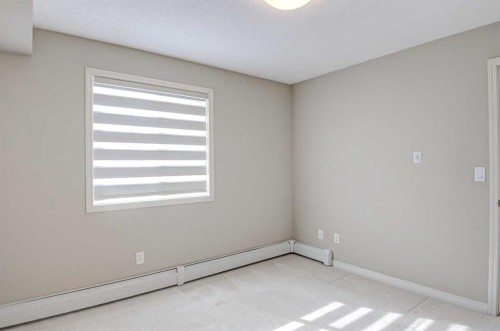 2217-130 Panatella Street Nw, Calgary, AB - Indoor Photo Showing Other Room
