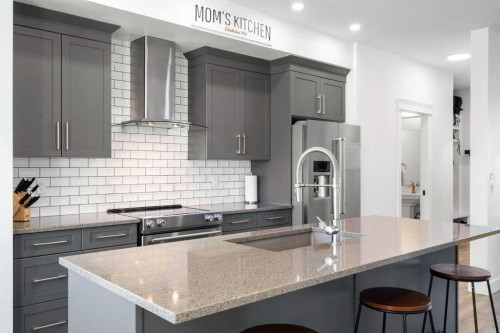 950 Mahogany Boulevard Se, Calgary, AB - Indoor Photo Showing Kitchen With Upgraded Kitchen