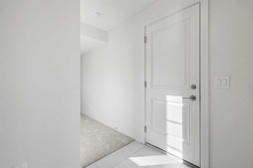 13 Waterford Glen, Chestermere, AB - Indoor Photo Showing Other Room