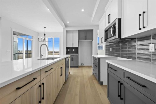 13 Waterford Glen, Chestermere, AB - Indoor Photo Showing Kitchen With Upgraded Kitchen