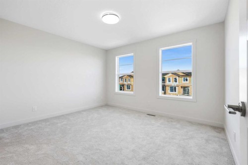 13 Waterford Glen, Chestermere, AB - Indoor Photo Showing Other Room