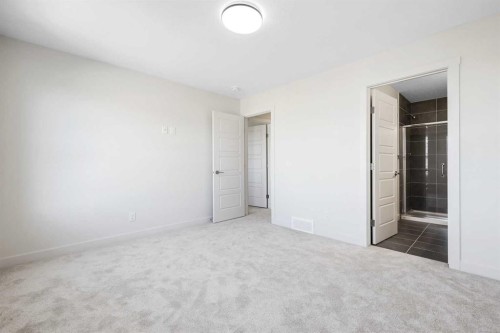 13 Waterford Glen, Chestermere, AB - Indoor Photo Showing Other Room