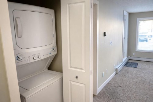 2103-625 Glenbow Drive, Cochrane, AB - Indoor Photo Showing Laundry Room